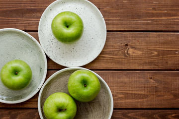ripe green apples wooden table background top view space for text