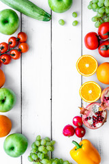 cooking salad with fresh fruits and vegetables on white background top view mock-up