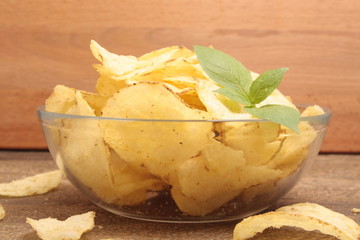 Potato chips in a glass plate