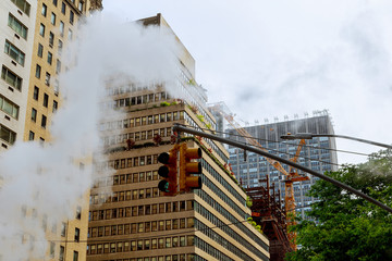 air steam, accident, repairhot air into the street in Midtown Manhattan.