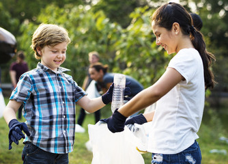 Ecology group of people cleaning the park