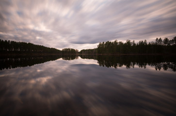 Cloudy evening in the nature reserve malingarna in dalarna, sweden photographed with long exposure