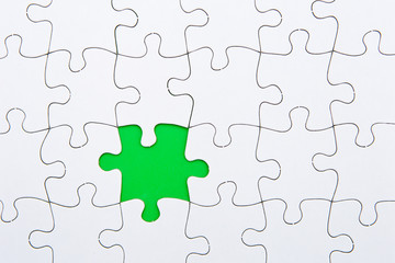 Puzzle Pieces - white with green missing space
