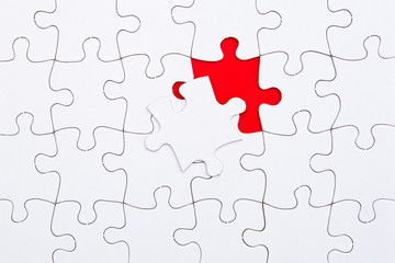Puzzle Pieces - white with red missing space
