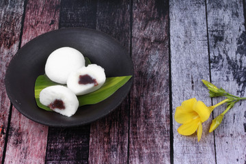 Japanese dessert ,Steamed rice flour cake fillin sweet red bean.