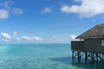 Water villas in tropical Maldives island