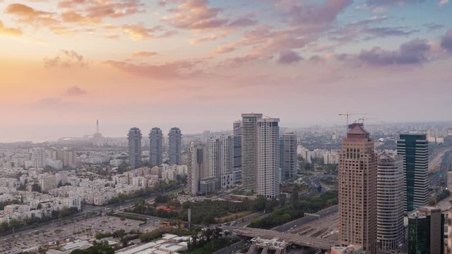 Tel Aviv And Ramat Gan Aerial View - Time Lapse, Day To Night - Tilt Down Fast Version