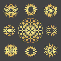 Set of abstract gold flowers.
