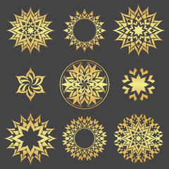 Set of abstract gold flowers.