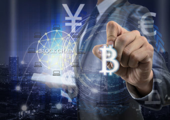 Double exposure of businessman using tablet and writing the bitcoins and block chain over the innovation technology virtual screen on cityscape background,US dollar and other currency,Fin tech concept