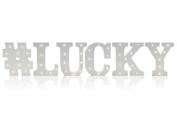 Illuminated Decorative Letters Spelling #LUCKY Over White Background