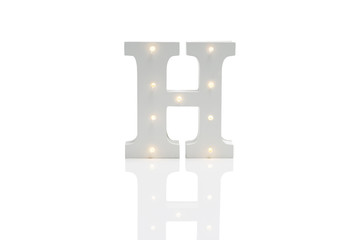 Decorative Letter H with Embedded LED Lights Over White Background