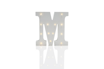 Decorative Letter M with Embedded LED Lights Over White Background