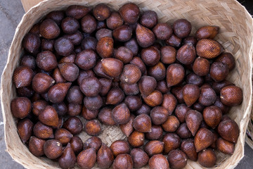 Exotic Snake Fruit or local name called Salak display for sell in market. Bali island, Indonesia.