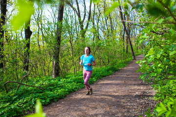 Girl running in the woods..