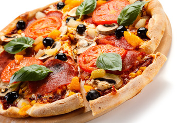 Pizza pepperoni with tomatoes, mushrooms and olives