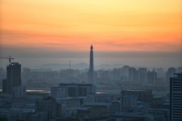 Fototapeta na wymiar Sunrise over Pyongyang, DPRK - North Korea. April 29, 2017.