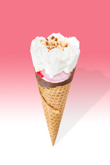 Strawberry ice cream cone with cream and almond stuffed with strawberry jam isolated on pink and white background (clipping path included)