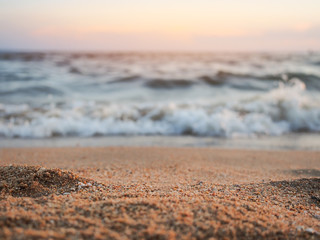 Sand and sea wave in sunset time for background.