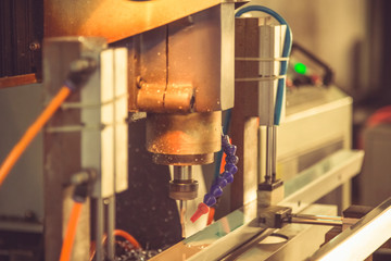 drilling machinery with pipelines in factory.