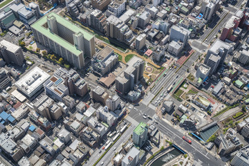 Fototapeta premium Tokyo urban area with streets and buildings, aerial view, Japan