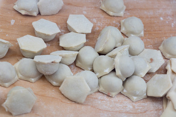 Fototapeta na wymiar The process of making dumplings in the kitchen.