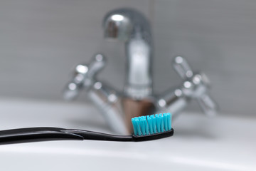 Toothbrush, oral hygiene. Bathroom. Selective focus.