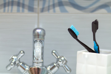 Toothbrush, oral hygiene. Bathroom. Selective focus.