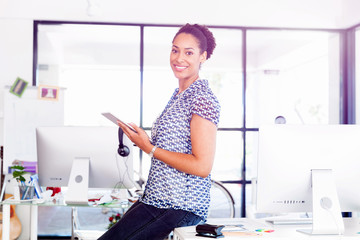 Portrait of smiling afro-american office worker in offfice