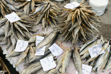 Dried salted fish lying on the counter. City market, Russia
