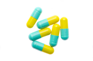 Pills on white background