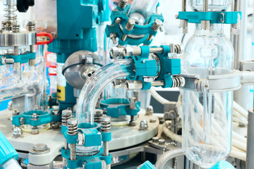 Chemical industrial equipment, glass tubes and containers.