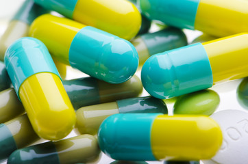 Background of yellow green pills