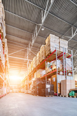 Fototapeta premium Long shelves with a variety of boxes and containers.