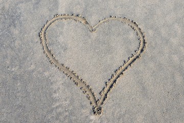 sand background with heart