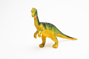 Dinosaur toy plastic figures on white background