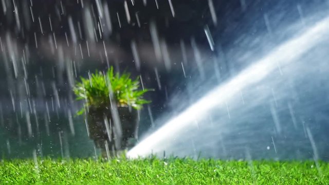 Soccer or football field irrigation system of automatic watering grass. With original sound.