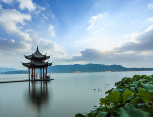 ancient pavilion of Hangzhou west lake at dusk, in China