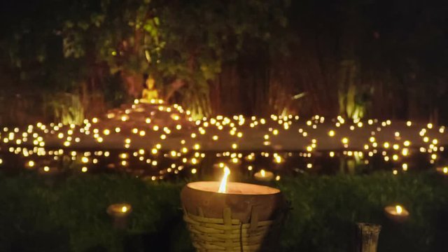Visakha Bucha Day , candles in religious ceremony ,Chiang mai Thailand.