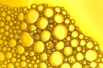 Yellow water bubbles abstract light illumination