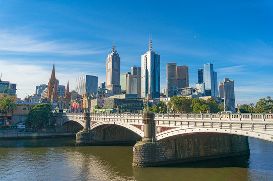 Melbourne CBD cityscape with Princess Bridge over Yarra river © Olga K