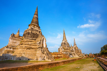 Fototapeta premium Ayutthaya, Thailand - December 20 2016: Wat Phra Si Sanphet temple in Ayutthaya Historical Park, a UNESCO world heritage site.