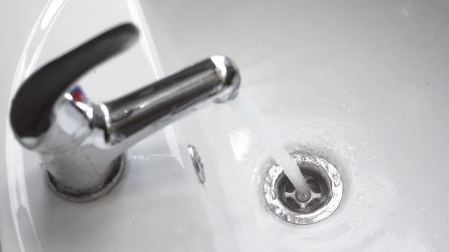 Water Tap Faucet With Flowing Water.