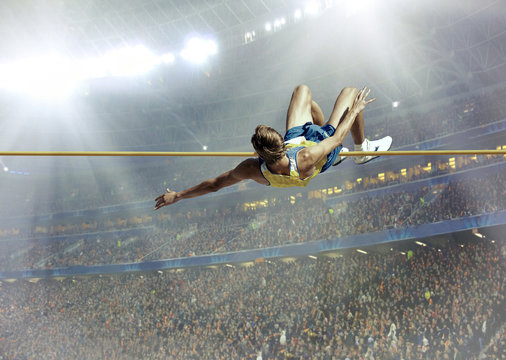 Athlete in action of high jump.