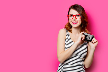 young woman with camera