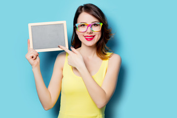 young woman with blackboard