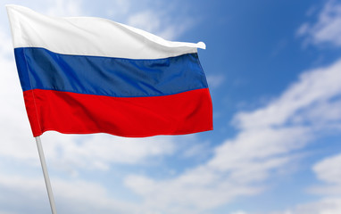 Fototapeta na wymiar Russian flag against blue sky
