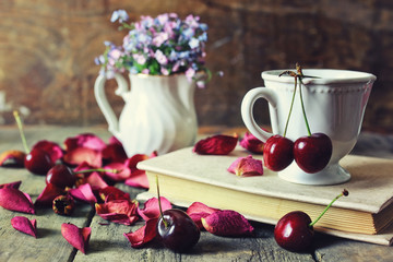 vintage composition cherry berry on wooden background