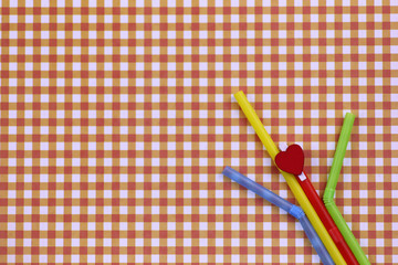 cocktail tubes lie on a bright color background