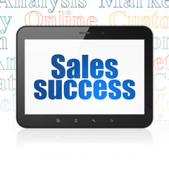 Marketing concept: Tablet Computer with Sales Success on display